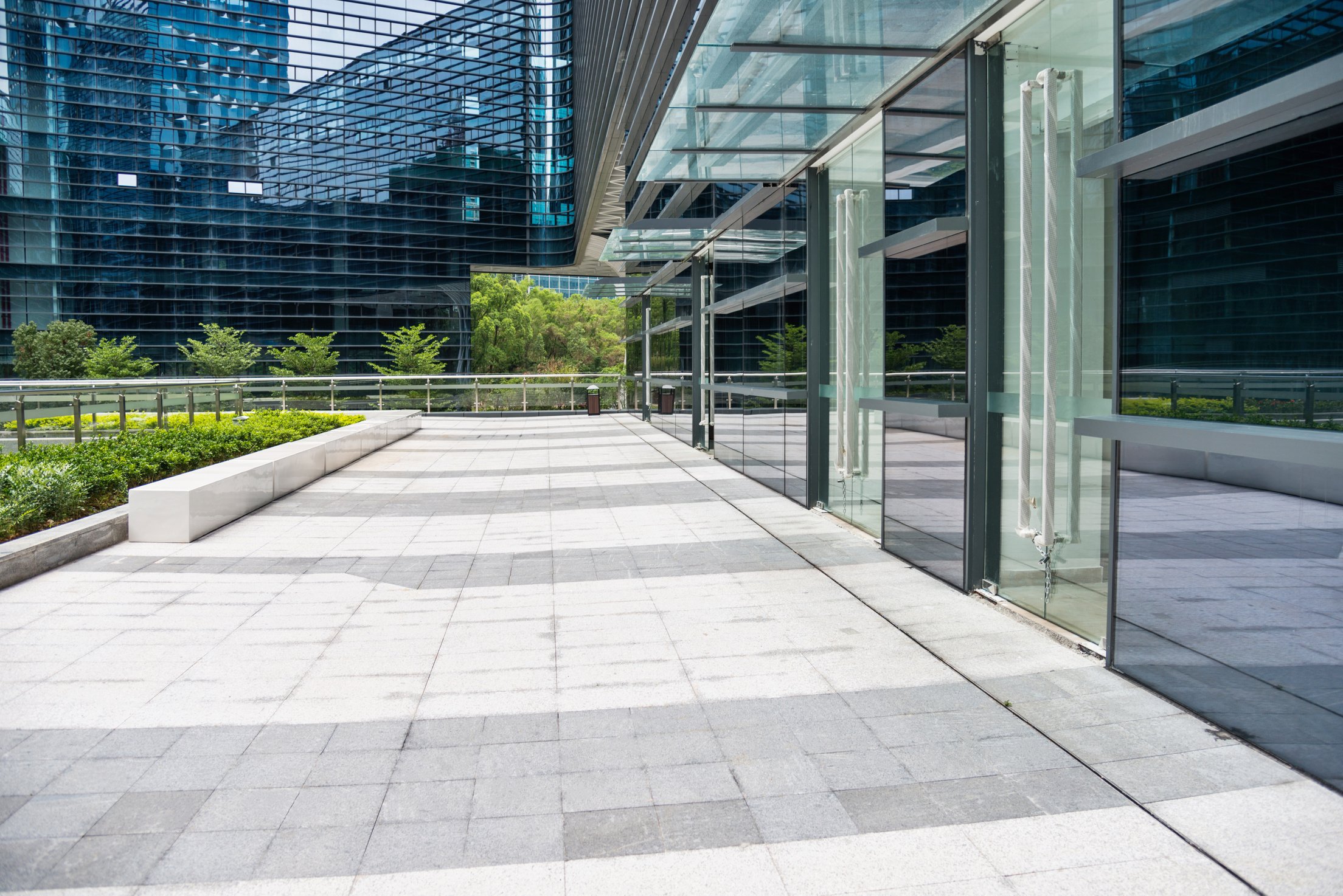 Stone sidewalk outside office building